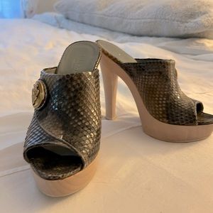 Authentic Gucci snakeskin open-toed heels perfect for summer.